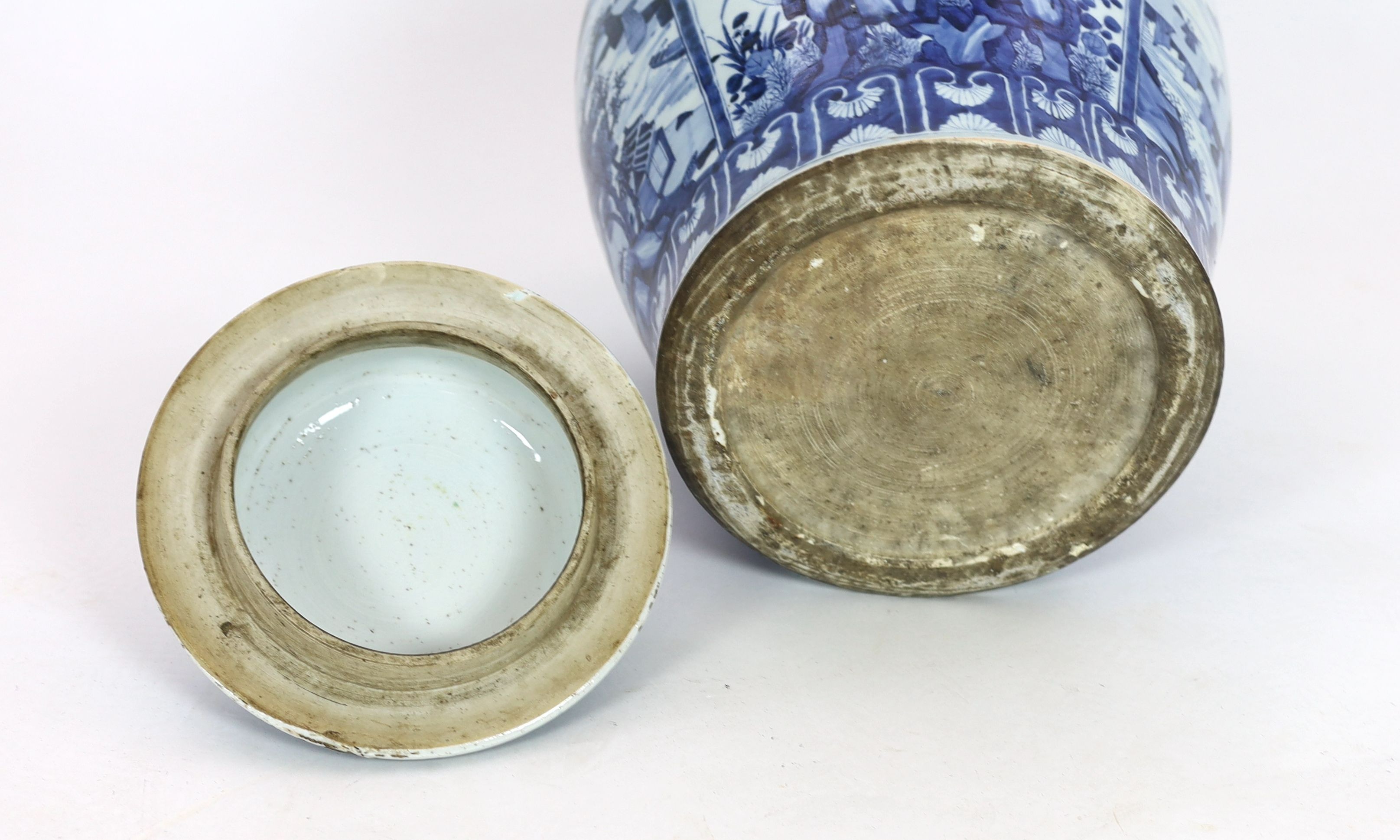 A large Chinese blue and white jar and cover, Kangxi period, 58cm high, Some restored cracks